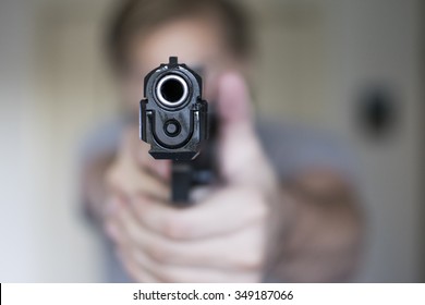 man-holding-handgun-self-defense-260nw-349187066